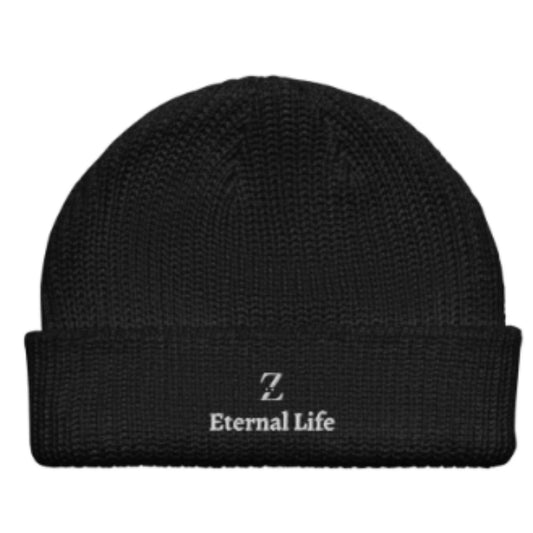Warm knitted wool hat with letter embroidery, perfect for early spring style and comfort.